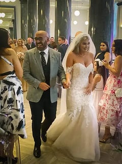 Couple Leaving At The End Of Their Wedding Ceremony