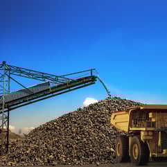 a large pile of rocks and graveled ground
