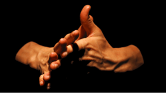 two hands with precise contours and reliefs rub against each other