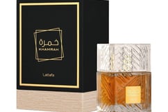 a bottle of old fashioned perfume with a box of perfume