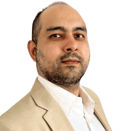 a man in a suit and tie with a white shirt