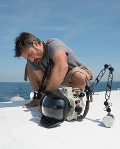 Nicolas Job preparing his underwater housing.