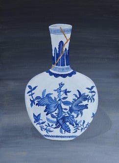 Blue and white vase with a gold leaf Kintsugi join
