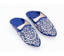 a pair of blue slippers with a white background