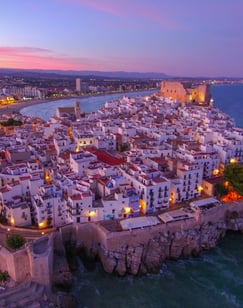 Peñiscola. a cityscape of a small town with a castle like structure