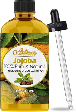 a bottle of jojoba oil pure
