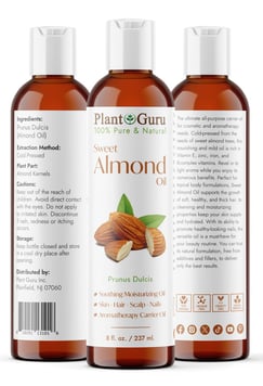 three bottles of sweet almond oil