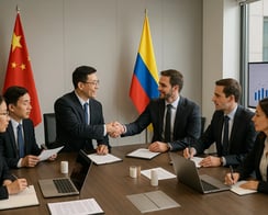 a group of business people sitting around a table
