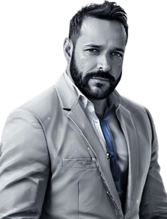 a man in a suit and tie with a beard