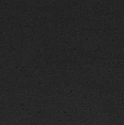 Schwarze, matte Arbeitsplatte.