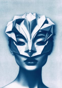 Close-up of a woman with blue-toned skin, wearing an intricate geometric paper mask covering her upp