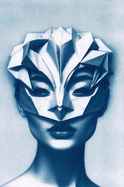 Close-up of a woman with blue-toned skin, wearing an intricate geometric paper mask covering her upp