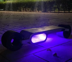 “Futuristic electric skateboard with LED lighting—innovative design for modern urban commuting.”