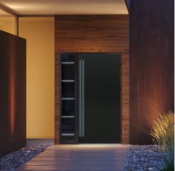 a door with a wooden door and a bench