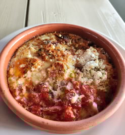 Eggs with sausage & cheese in the oven , at Sunset Drift tavern in Ksamil