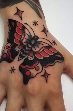 butterfly hand tattoo