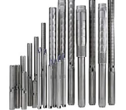 a group of different types of metal pipes and pipes