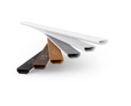 a group of three different colored plastic cutting boards