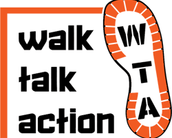 a pair of shoes with the words walk talk action