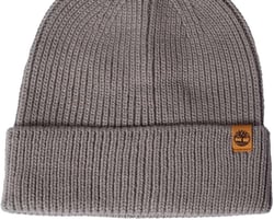 a grey hat with a leather label on the front of a grey beanie
