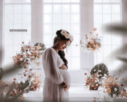 Pregnant mother glowing in maternity shoot at Vidaychandra Photostudio.