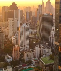 a city skyline view of a city at sunset