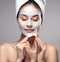 a woman holding a compact compact compact compact compact compact compact compact compact compact compact compact