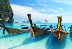 a number of boats in the water
