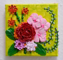 a painting of a flower on a green background