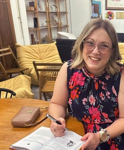 Julie Gachet Mitrovic signing her book – writer and coach