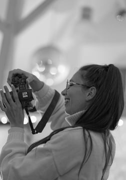 a woman taking a picture of herself taking a picture of herself
