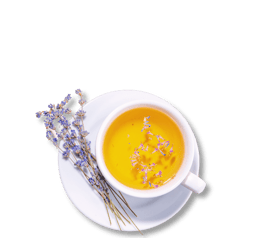 a cup of tea with a bouquet of lavender flowers