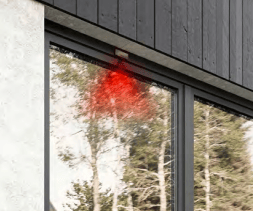 a red fire hydrant in front of a building