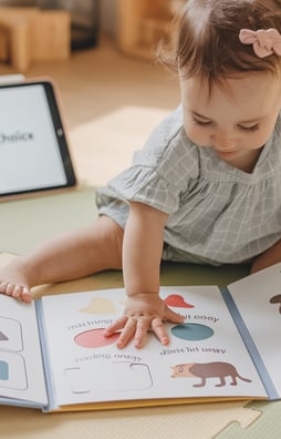 Toddler on Busy book