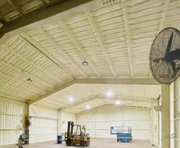 spray foam insulation inside of a barn in lakewood, colorado