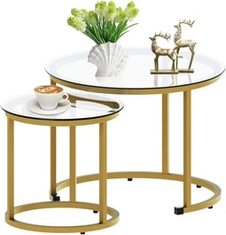 a coffee table with a vase and a vase with flowers