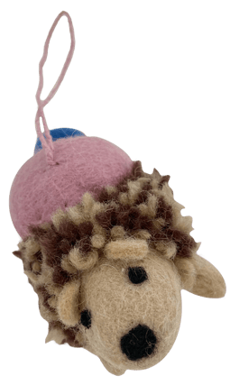 a stuffed animal with a pink hat on it
