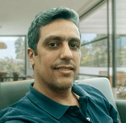 a man with a green hair and a blue shirt