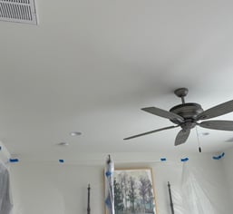 a ceiling fan with a ceiling fan and a ceiling fan