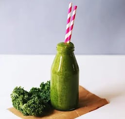 clear-glass-bottle-filled-with-broccoli-shake