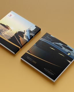 a book with a boat and a magazine cover