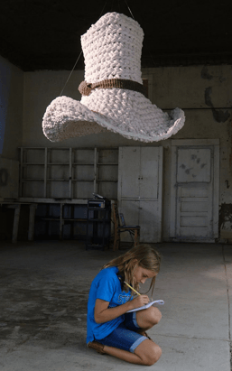 Tom Mix Wept hanging above a little girl by Dundee & Lee's Emilie Odeile & Ken Chapin.