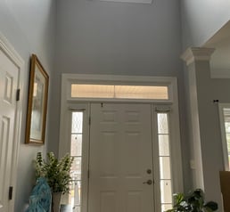 a large window with a skylight above it