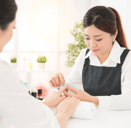 nail technition providing nail services 