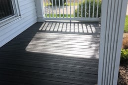 An old porch was transformed with composite decking in Ligonier, IN (completed transformation).