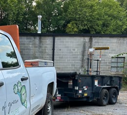 a company trailer with a heavy duty trailer attached