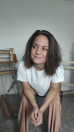 Artist's portrait in her workshop