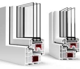 a pair of windows with a white frame and a red window