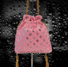 a pink sitara potli purse bag