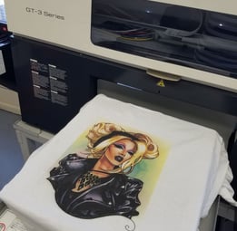 Custom heat transfer logo application on cotton hoodies